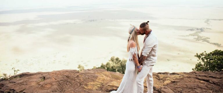 honeymooners on a rock