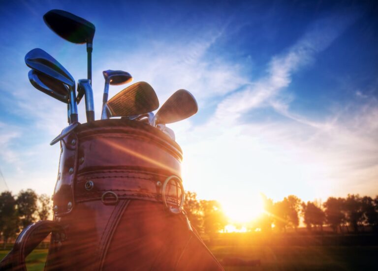 Golf clubs at sunset on your Kenya golf safari